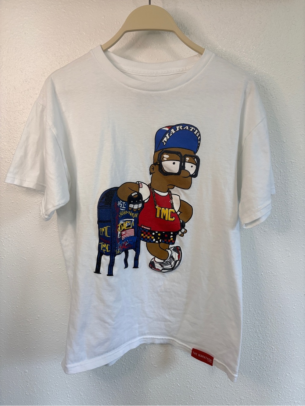 The Marathon Clothing Men's M White Crew Neck Short Sleeve Bart Simpson Logo Tee
